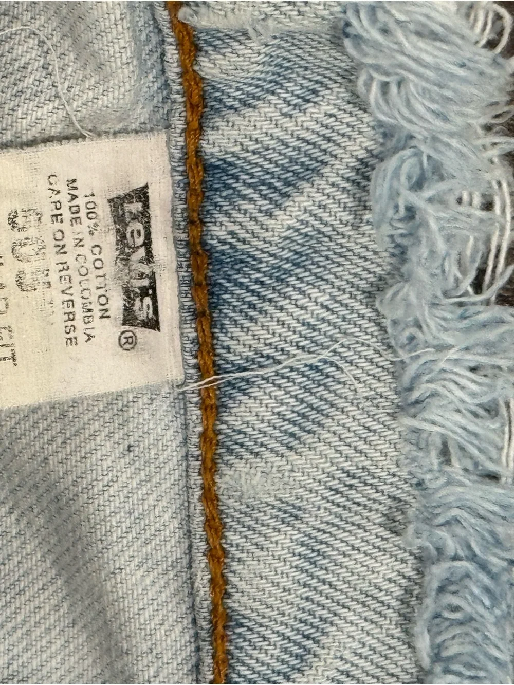 Vintage orange tab Y2K Light Blue Distressed Men’s Jeans with Patch Detail